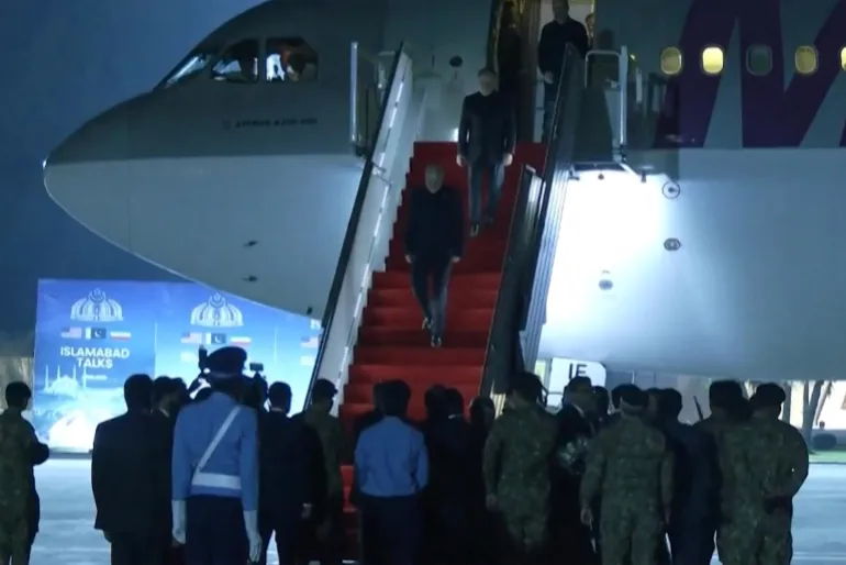 Iranian delegation descends aircraft stairs after arriving at Nur Khan Airbase in Islamabad for US-Iran talks.