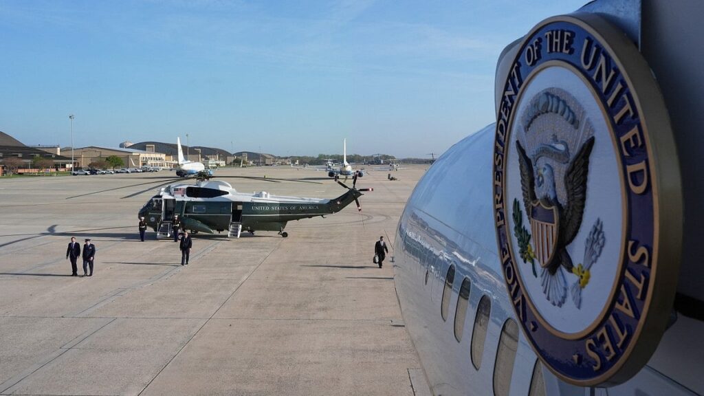 US Vice President aircraft and helicopter on airport tarmac as JD Vance arrives for talks.