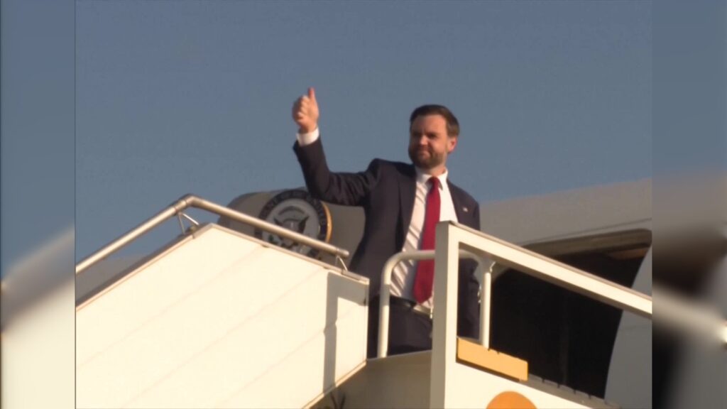 JD Vance waves as he departs Islamabad after failed US–Iran talks