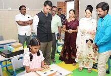 Children using new educational tools in a transformed school classroom.