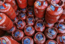 Stacked LPG gas cylinders for domestic use in India.