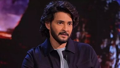 Mahesh Babu attending a film event, showcasing his charismatic presence and style.