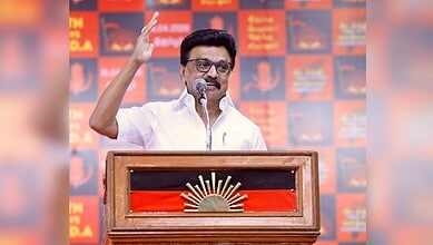 PM Modi speaking at a political rally, addressing the controversy over women’s quota policy and its impac.