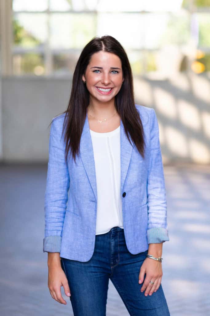 Assistant White House Press Secretary Olivia Wales poses for an official portrait indoors.