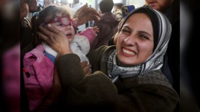 Palestinian mother reunites with daughter returned from Egypt at Nasser Hospital.