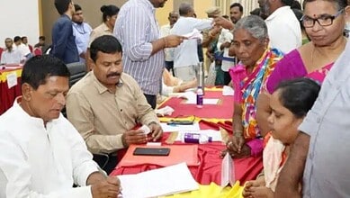 People engaging in Telangana Prajavani program at revenue division level.