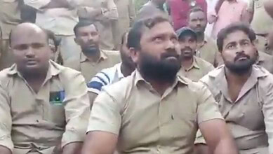 Group of private bus drivers protesting outside RTC depot in Mancherial, expressing their demands and con.