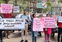 Hyderabad citizens protest for labour activists' release in Noida, holding signs against state repression.