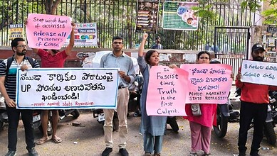 Hyderabad citizens protest for labour activists' release in Noida, holding signs against state repression.