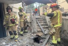 Damage in Rosh Haayin after Iranian missile strike, firefighters inspect debris.