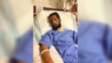 Man in hospital bed with medical tubes, family struggles to meet visa deadline in Saudi Arabia.