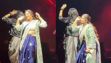 Fans teasing Shreya Ghoshal during a live performance on stage.
