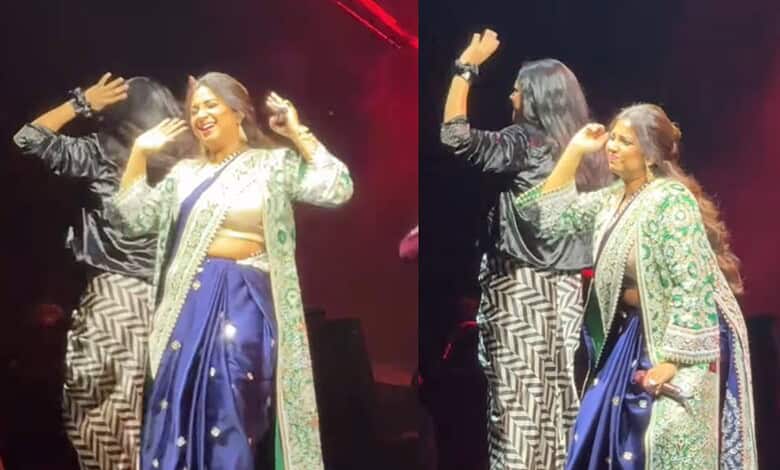 Fans teasing Shreya Ghoshal during a live performance on stage.
