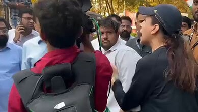 Woman commuter challenges BJP minister amid traffic disruption caused by rally.