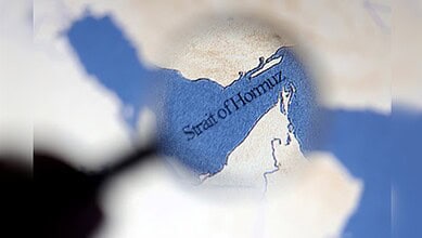 Map highlighting the Strait of Hormuz between Iran and Oman, showing key shipping lanes and surrounding Gulf waters.