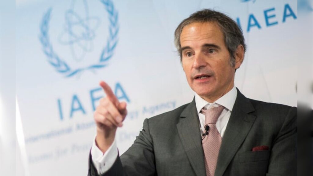 Rafael Grossi speaking at an IAEA event, gesturing during a press briefing.