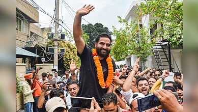AAP MLA Mehraj Malik greets supporters in Doda after jail release.