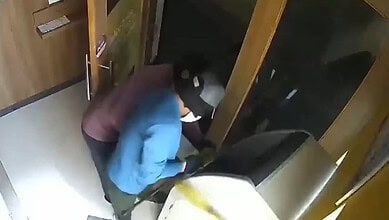Thieves dragging away IDFC Bank ATM using a Bolero vehicle in Andhra Pradesh.