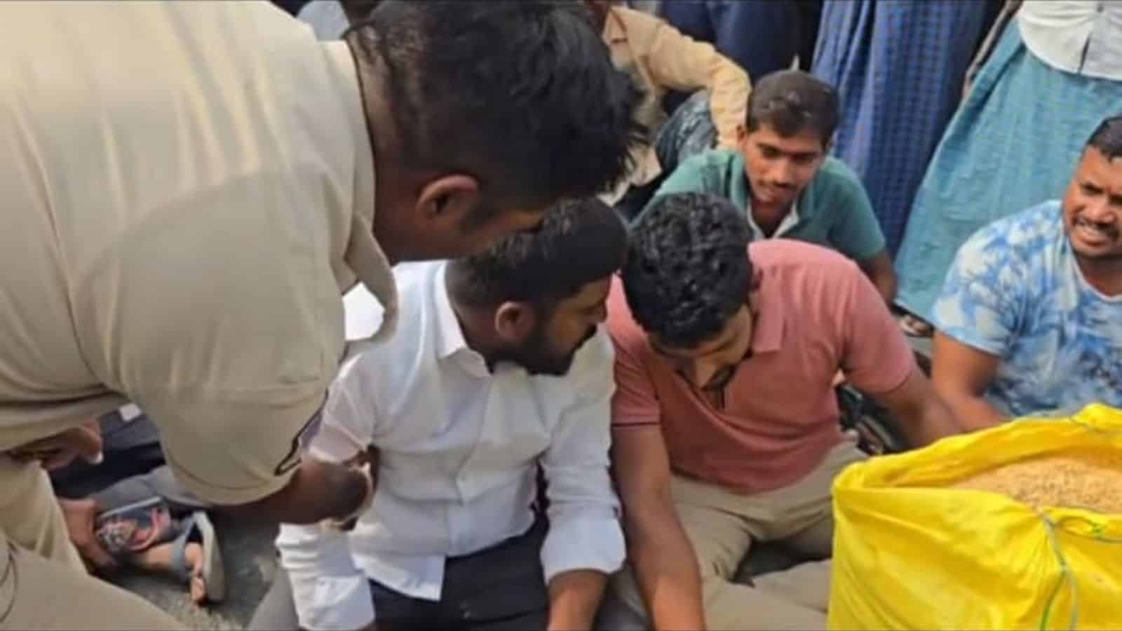 The image shows BRS workers protesting against the delay in paddy procurement in Vemulawada assembly constituency on Monday, May 25, 2026.