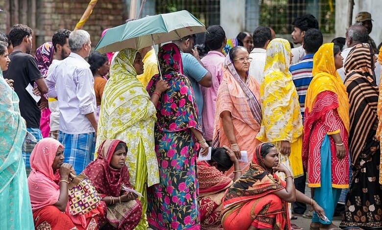 Voters waiting in line during re-polling at 15 booths in West Bengal, with a 37% turnout till 11 am.