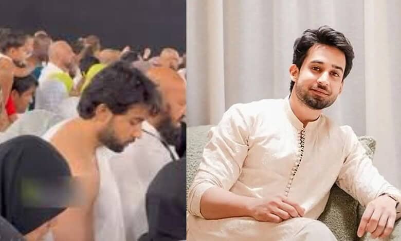 Bilal Abbas Khan during Haj pilgrimage in Saudi Arabia, taking a break amidst a large gathering.