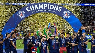 PSG players celebrating their UEFA Champions League Final 2020 victory with confetti and trophies.