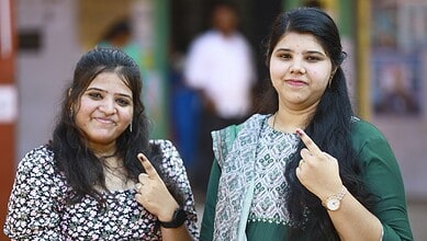 Women casting their votes during Tamil Nadu assembly elections, highlighting women's role in politics.