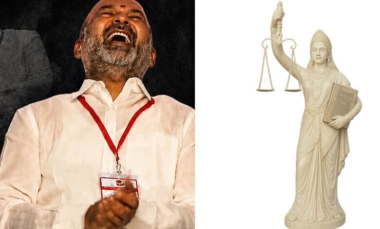 Man laughing joyfully at a legal event, with a statue of Lady Justice holding scales and a sword in the b.