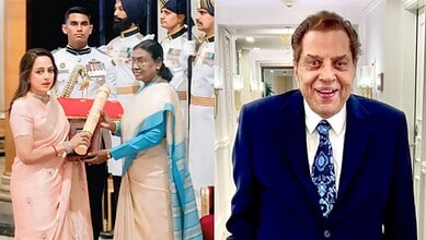Royal award presentation to a woman by a dignitary in a formal setting.