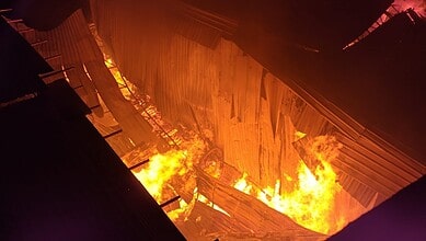 Massive fire at Bahadurpura scrap yard near Hyderabad zoo with intense flames and smoke.