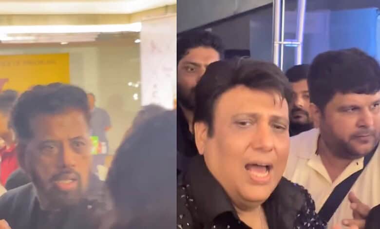 Group of people celebrating at The Siasat Daily office, with lively expressions and festive atmosphere.