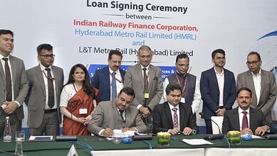 Officials at the loan signing ceremony between Indian Railway Finance Corporation and Hyderabad Metro Rai.