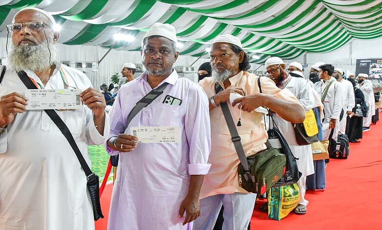 Haj pilgrims waiting in line at registration for travel amid government easing burden.