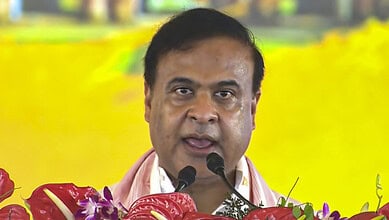 Himanta Biswa Sarma taking oath as Assam Chief Minister during the swearing-in ceremony.
