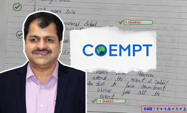 Accessible, professional portrait of a man in a suit with a background featuring handwritten notes and th.