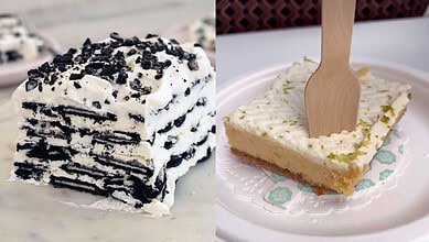 Delicious Oreo layered cake with creamy frosting and cookie crumbs, served alongside a slice of cheesecak.
