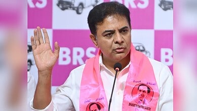 BRS leader Bharti Prasad Sahu speaking at a press conference with a pink background.