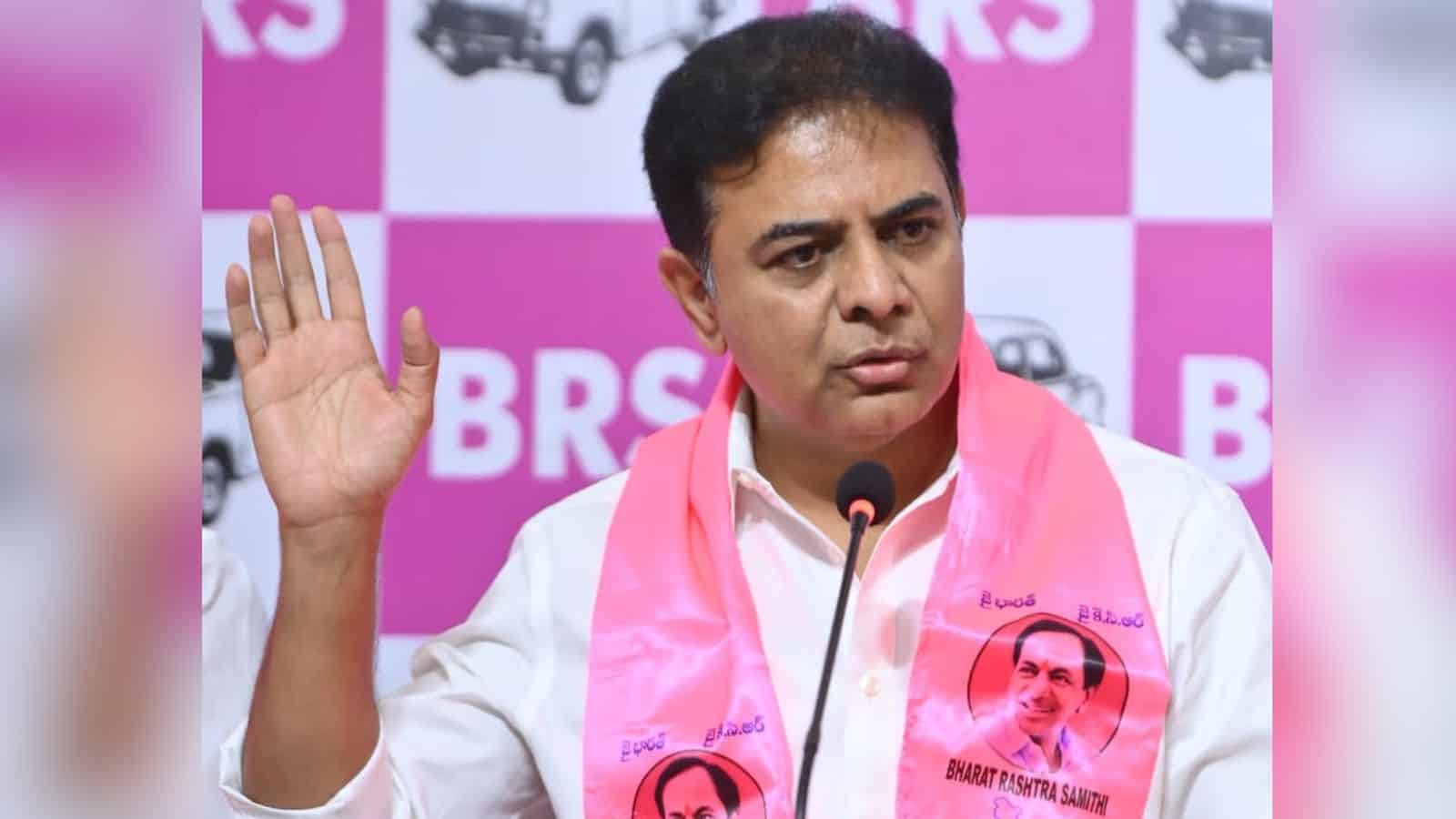 BRS leader Bharti Prasad Sahu speaking at a press conference with a pink background.