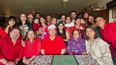 Celebration of Christmas with a diverse group of people, including children and seniors, in a festive ind.