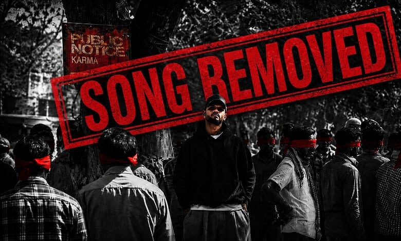 Rapper Karma's song removed over alleged anti-national remarks, protest scene with masked individuals in.