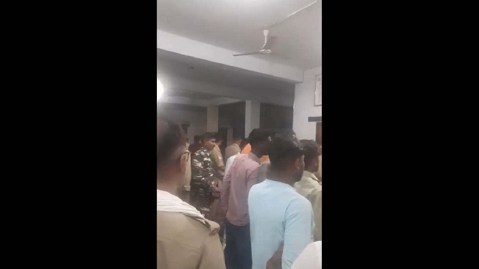 Crowd gathered at the scene of a fatal accident involving a speeding car and a bike in Uttar Pradesh.