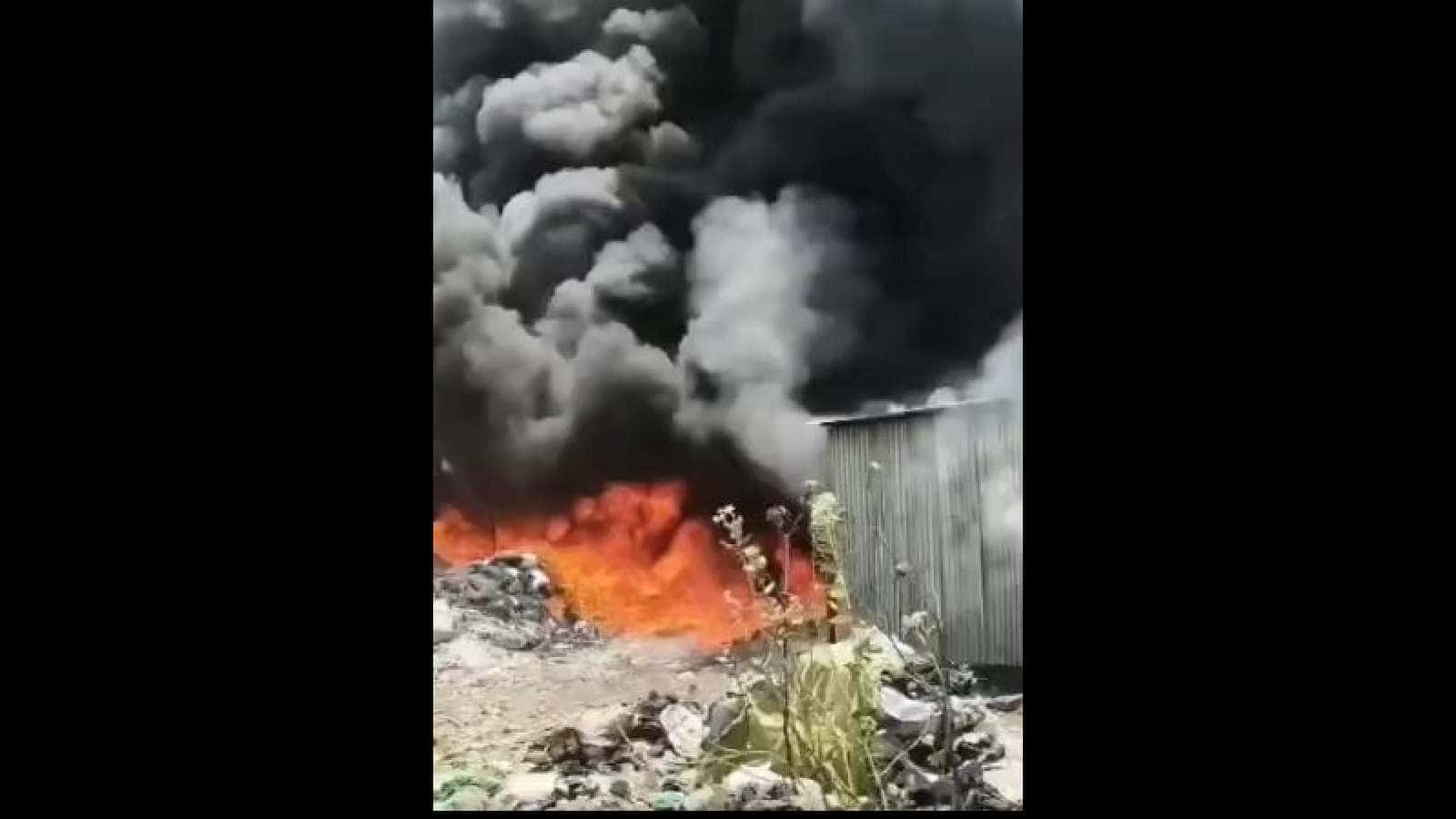 Fire erupts at plastic warehouse in Kothapet, with thick black smoke and flames engulfing the site. Emerg.