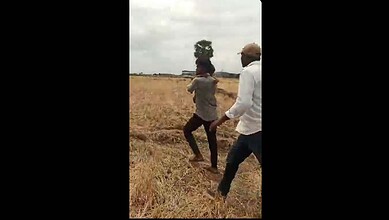 villagers take boy to safety after he was rescued from the borewell in Nalgonda