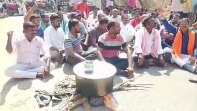 The image shows farmers protesting against the delay in procurement of paddy at the paddy procurement centre in Yellareddipally village of Indalwai mandal of Nizamabad district on Friday, May 1, 2026.