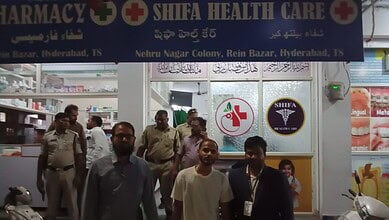 Affordable Shifa Health Care pharmacy in Hyderabad with staff and customers outside the store.