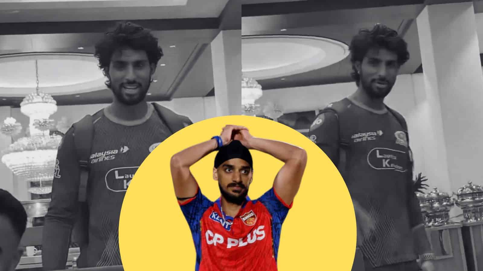 A young male athlete in a sports jersey with a serious expression, standing indoors with elegant chandeli.