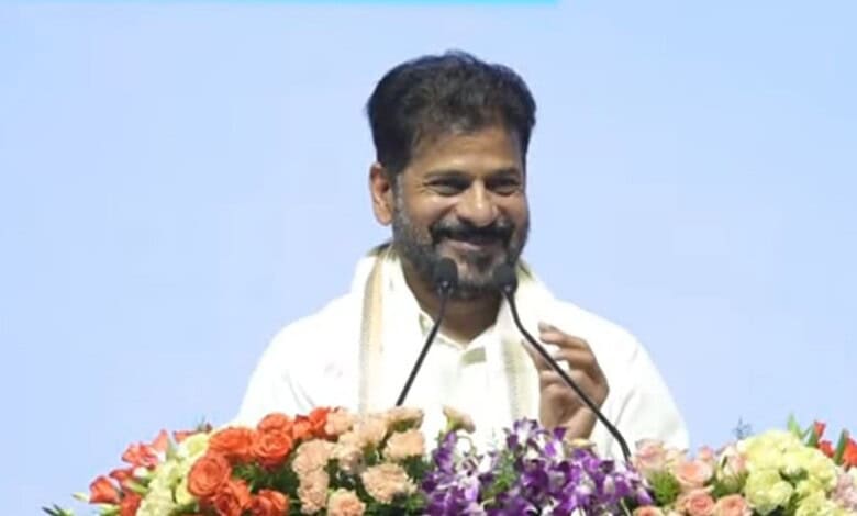 The image shows Telangana CM A Revanth Reddy addressing the launch of Education Week as part of the 99-day action plan held at LB Stadium on Monday, May 11, 2026.