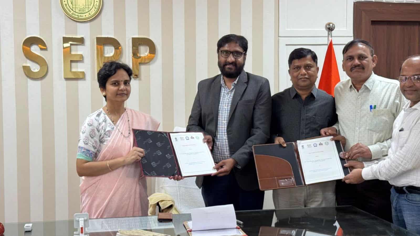 Group of professionals signing documents at SEPP office, India.