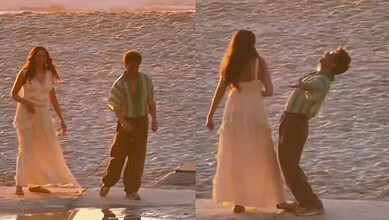 Shah Rukh Khan and Deepika Padukone painting the beach with two others, capturing a romantic moment.