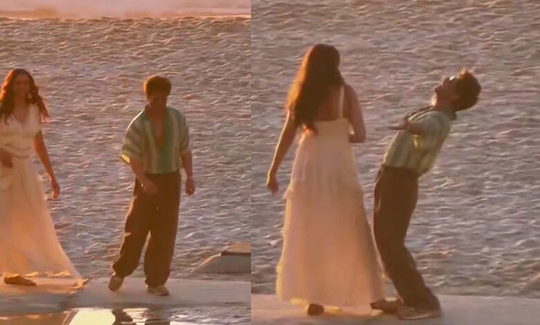Shah Rukh Khan and Deepika Padukone painting the beach with two others, capturing a romantic moment.